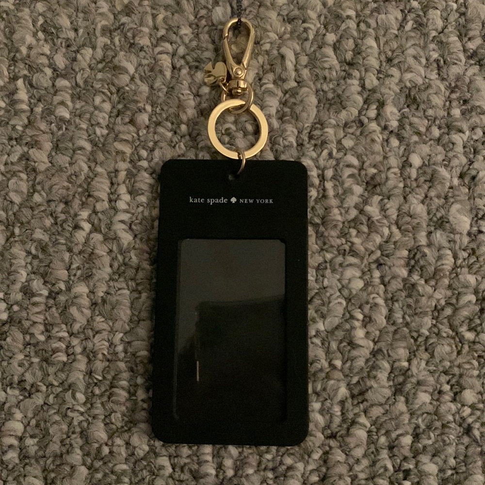 Black and white polkadots and gold hardware Kate spade badge holder